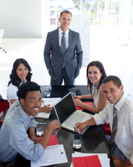 Business people smiling in a meeting