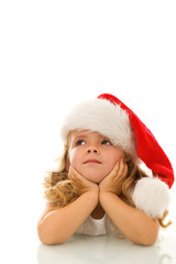 Little girl thinking about christmas