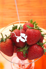 Fresh strawberries in a glass