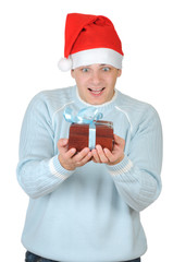 man in Santa's hat holding gift box. Isolated on white