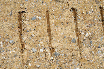 Tractor tracks in gravel