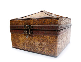 Cosed and locked treasure chest on white background