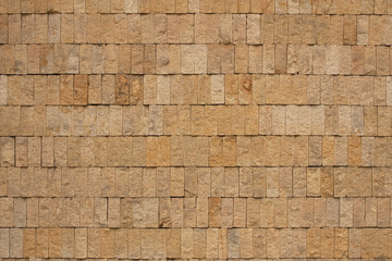 Wall of ochre bricks