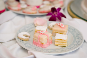Cream cakes on a plate