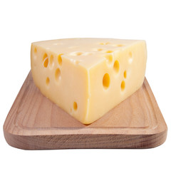 cheese on a grunge wooden board