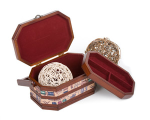 fancy wooden sewing box with clews in it
