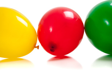 Multi-colored balloons on white