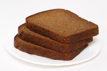 Fototapeta na wymiar Three slices of black bread