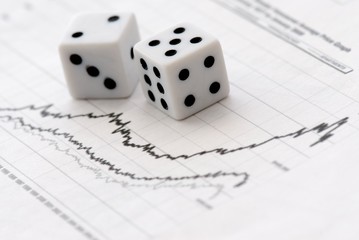 Pair of dices over Financial Chart