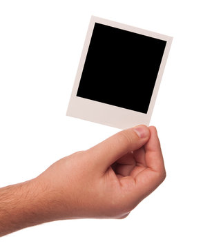 hand holding polaroid photo