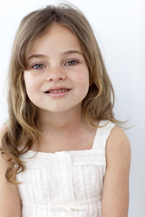 Fototapeta premium Portrait of a smiling little girl