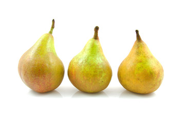 Three pears in a row over white background