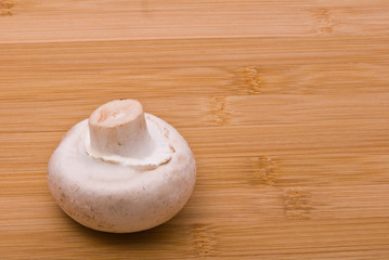 Fresh mushrooms on a chopping board