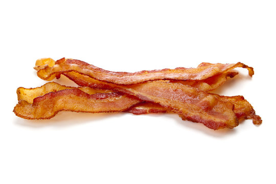 Slices of bacon on a white background