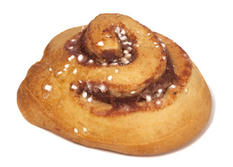 Delicious fresh cinnamon bun isolated on white background.