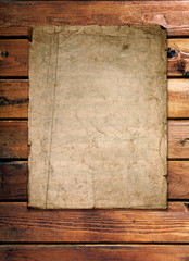 old paper on wood wall