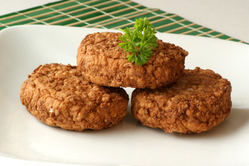 rissole with organic parsley on a plate