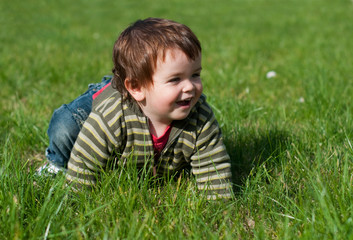 Smiling baby on the grass