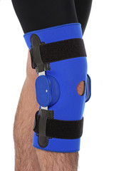 Man wearing a leg brace, over white