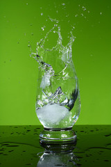 water splash in Oster, green background