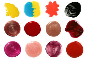 set of nail polish and lip gloss samples isolated on white