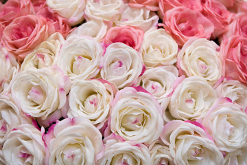 Big bunch of multiple pink roses of a bride on a wedding.