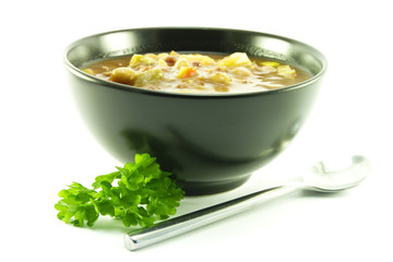 Vegetable Soup in a Black Bowl