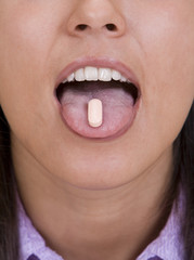 Pill on the tongue