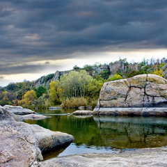 landscape with lake and stones