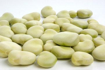 organic broad beans and a white background