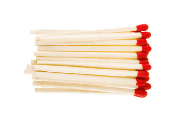 Set of red matches close up on white background