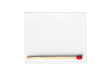 red match on a white box isolated on a white background.