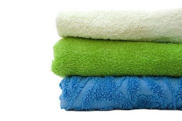 White green and blue towels over white