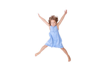Fototapeta na wymiar Little girl jumps