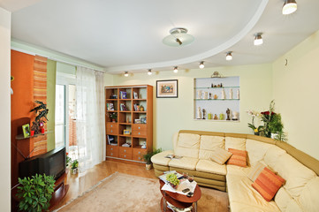 Drawing-room Interior with beige corner leather Sofa