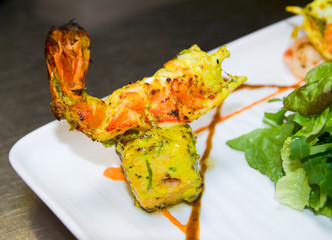 Tandoori shrimp and marinated chicken