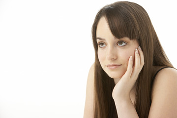 Fototapeta premium Studio Portrait Of Teenage Girl On White Background