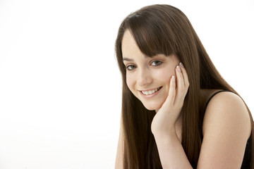 Fototapeta premium Studio Portrait Of Teenage Girl On White Background