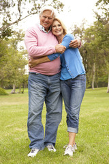 Fototapeta premium Senior Couple Walking In Park