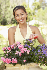 Young Woman Working In Garden