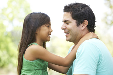 Fototapeta premium Father And Daughter In Park