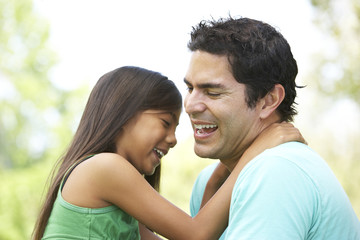 Obraz premium Father And Daughter In Park