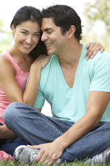 Obraz premium Portrait Of Young Couple In Park