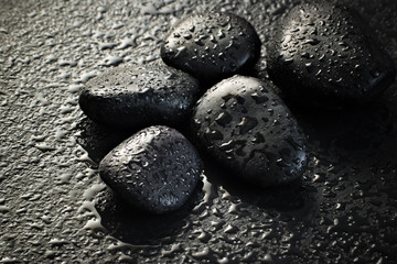 Obraz na płótnie Canvas wet black stones