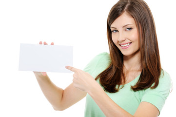 Young beauty woman pointing on the blank card