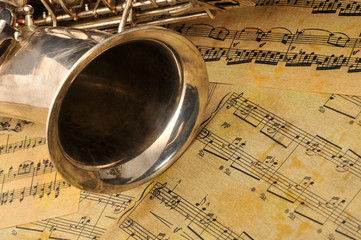 Old saxophone and notes