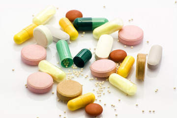 Colorful tablets on white