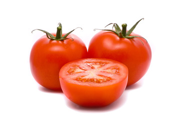 Fresh tomatoes. Macro studio isolated on white.