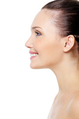 Fototapeta premium smiling woman's face with clean pure skin