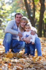 Fototapeta premium happy family in autumn park